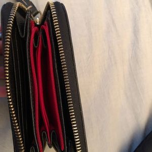 Dooney & Bourke zip up wallet